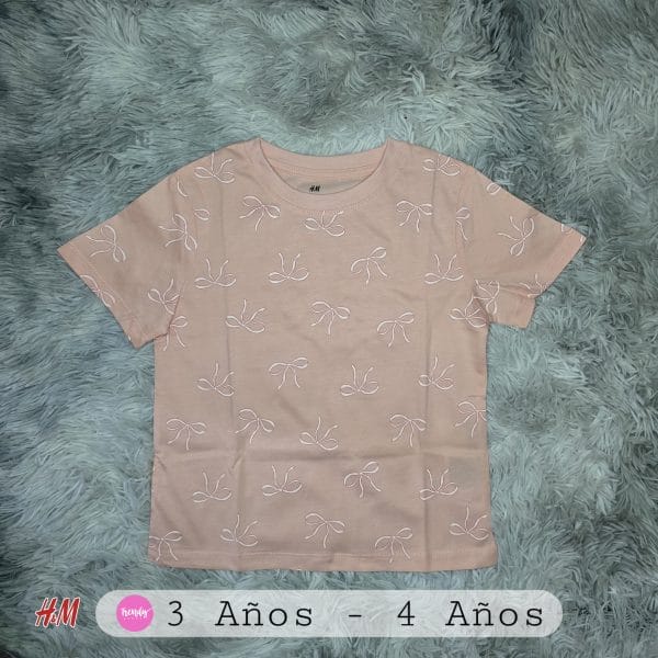 Blusa rosa moños